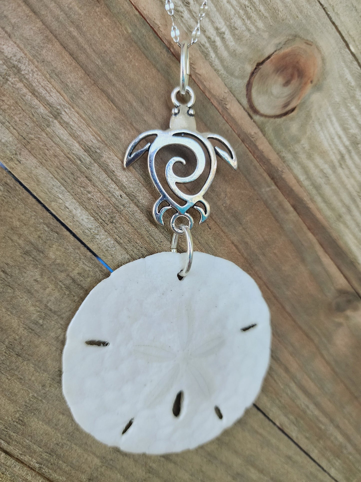 Genuine handmade sand dollar necklace, accented with a silver sea turtle charm. Sea turtle necklace. Sand dollar pendant. Beach necklace.