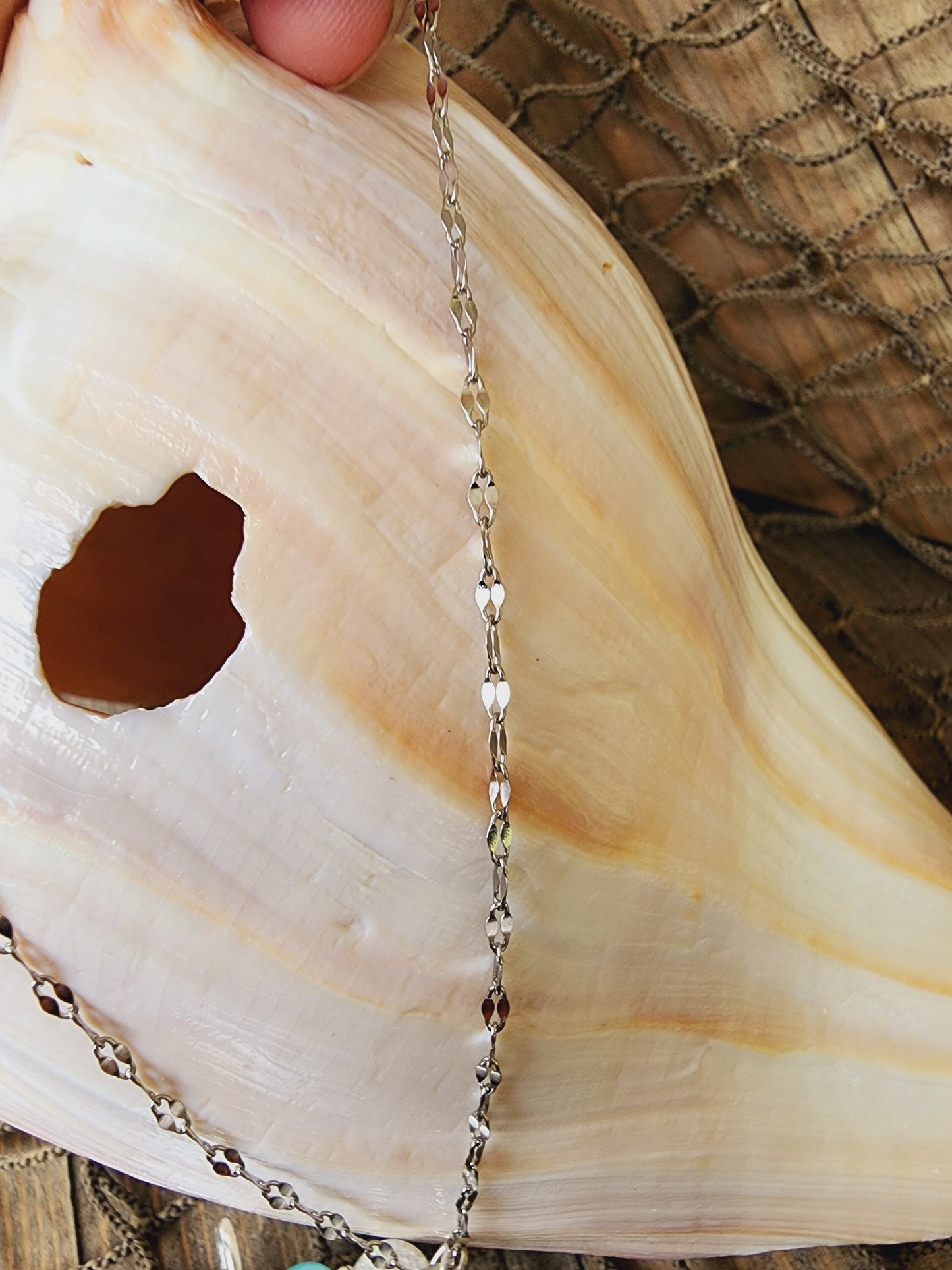 Handmade natural sand dollar necklace and earring set accented with aqua and white crackle beads. Perfect for beach wedding or bridesmaids.