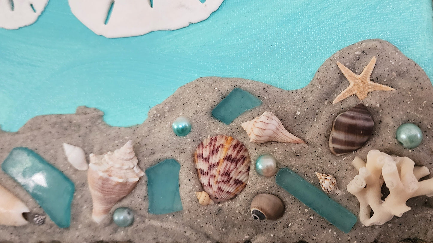 Hand painted 8x8 beach canvas made with genuine local sand and shells with beautiful starfish, sand dollars and scallops, jute rope border.
