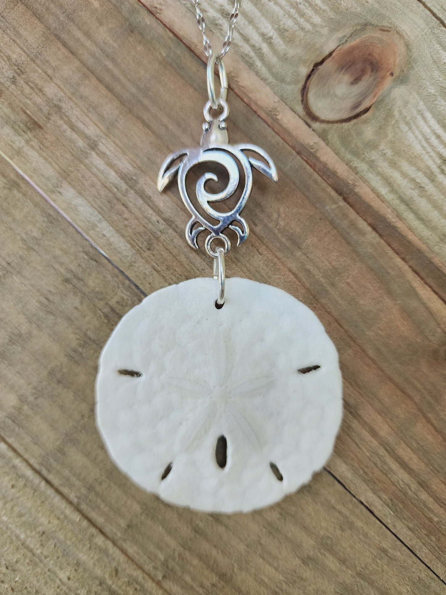 Genuine handmade sand dollar necklace, accented with a silver sea turtle charm. Sea turtle necklace. Sand dollar pendant. Beach necklace.