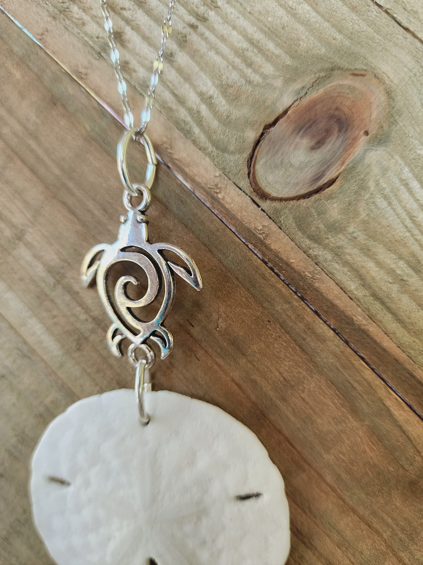 Genuine handmade sand dollar necklace, accented with a silver sea turtle charm. Sea turtle necklace. Sand dollar pendant. Beach necklace.