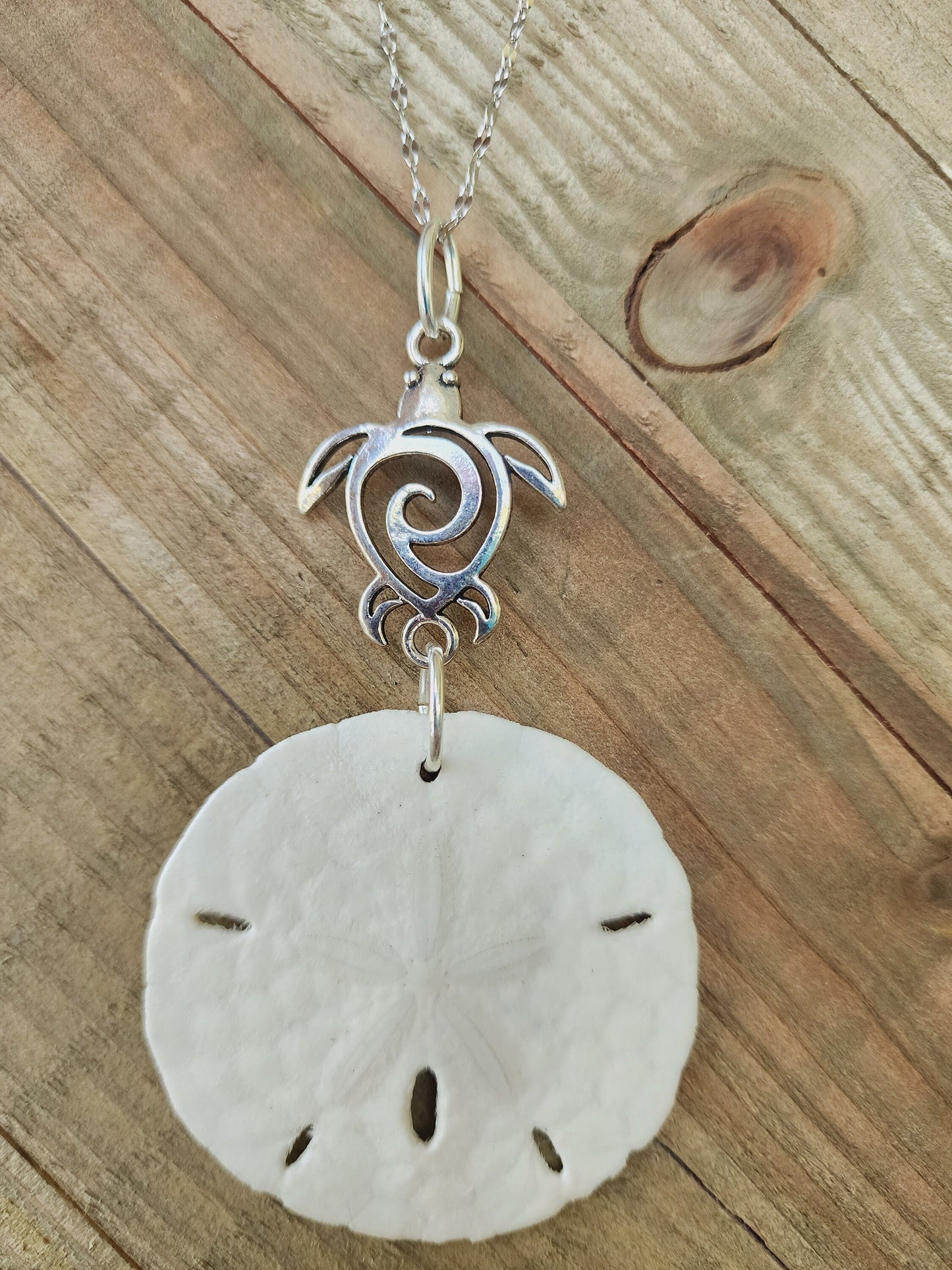 Genuine handmade sand dollar necklace, accented with a silver sea turtle charm. Sea turtle necklace. Sand dollar pendant. Beach necklace.