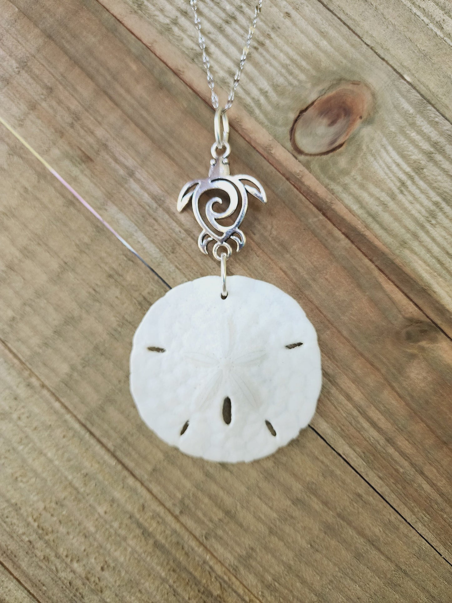 Genuine handmade sand dollar necklace, accented with a silver sea turtle charm. Sea turtle necklace. Sand dollar pendant. Beach necklace.
