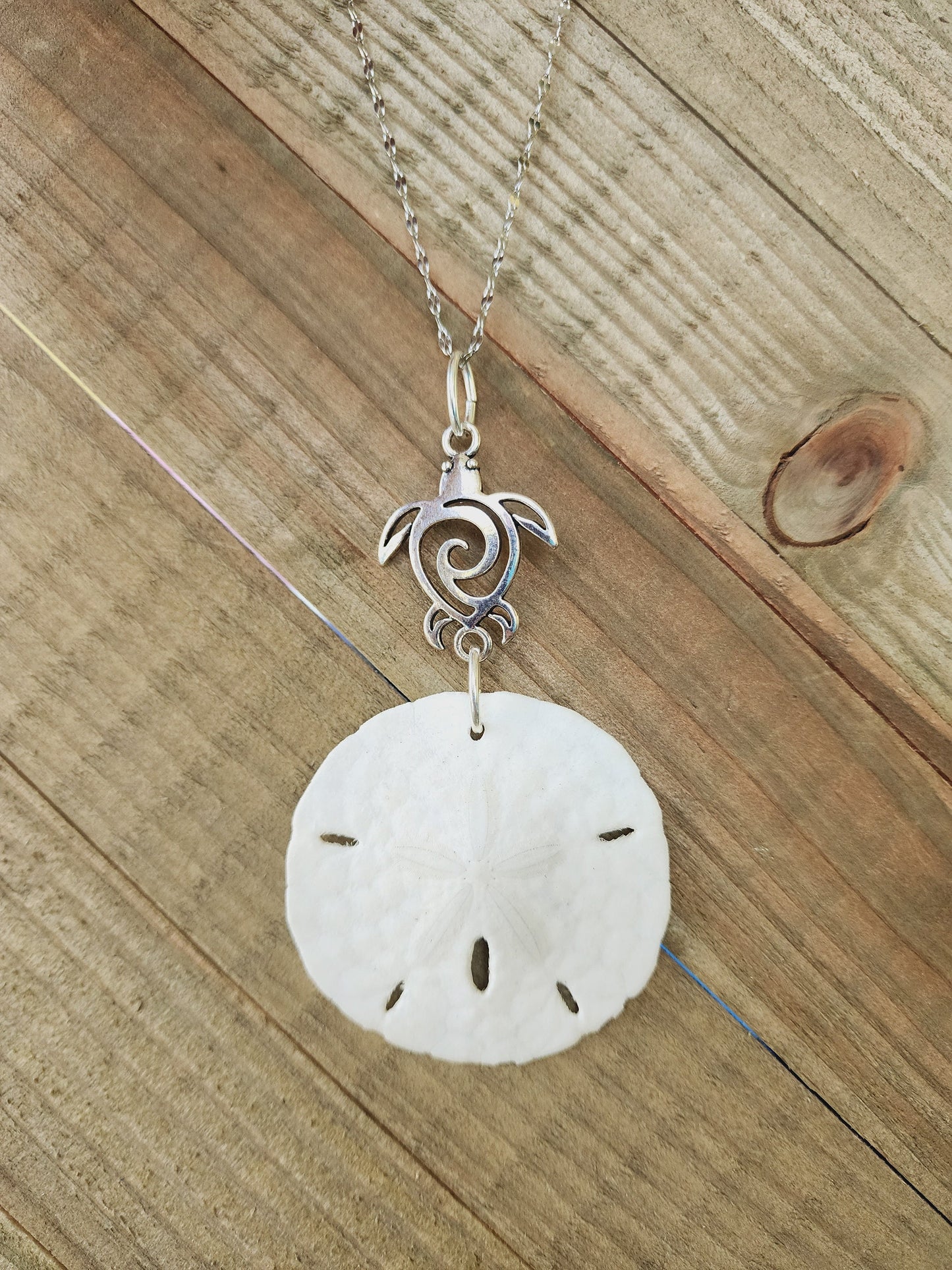Genuine handmade sand dollar necklace, accented with a silver sea turtle charm. Sea turtle necklace. Sand dollar pendant. Beach necklace.