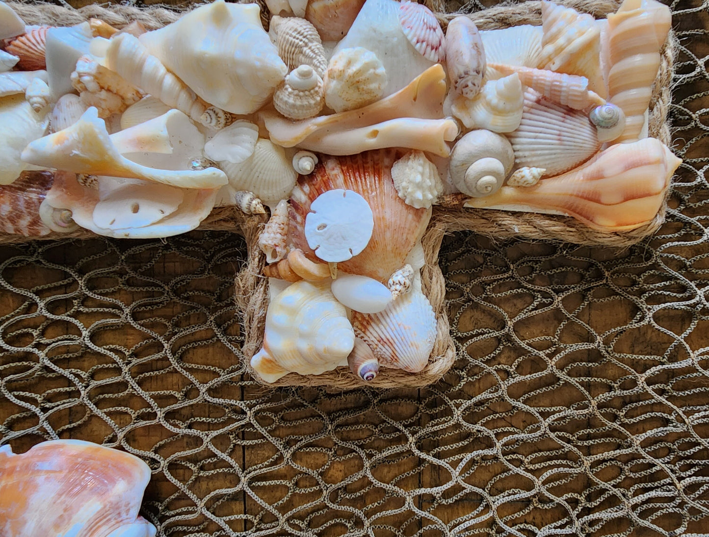 Coastal seashell cross 12x7 wall art. Perfect for a beach wedding, wedding gift, housewarming gift, or to add to your beach house decor
