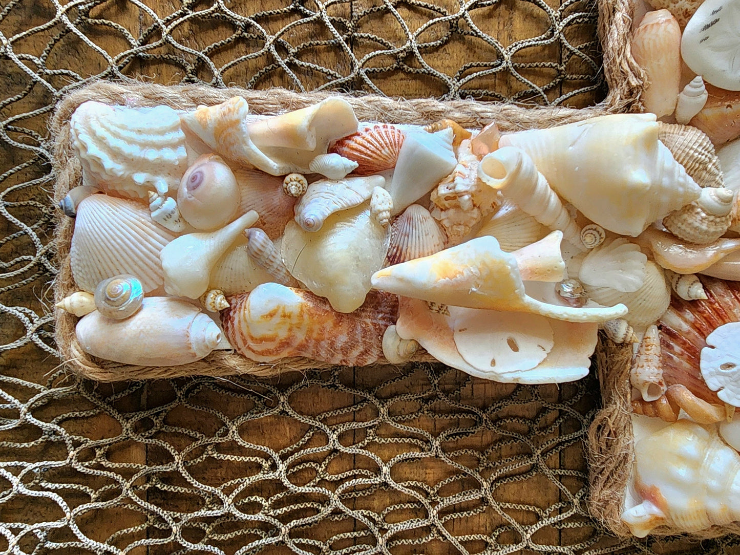 Coastal seashell cross 12x7 wall art. Perfect for a beach wedding, wedding gift, housewarming gift, or to add to your beach house decor