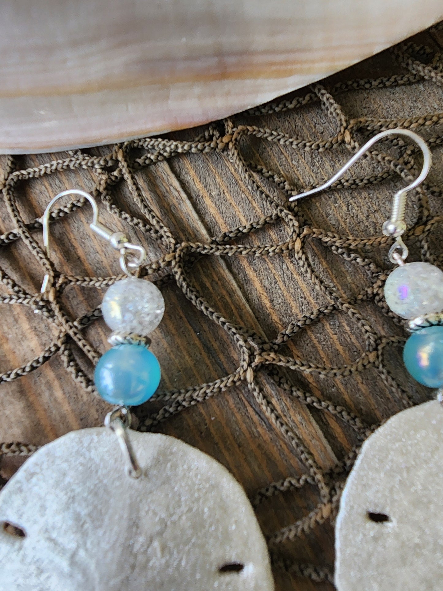 Handmade natural sand dollar necklace and earring set accented with aqua and white crackle beads. Perfect for beach wedding or bridesmaids.