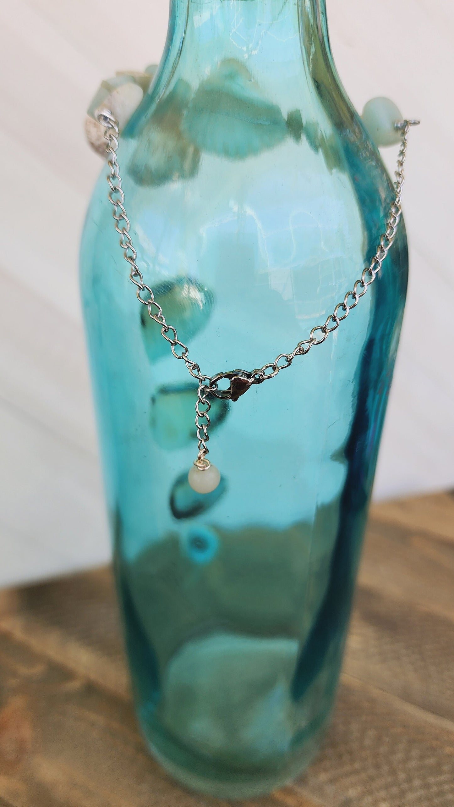 Beautiful, handmade fancy ark seashell bracelet or anklet accented with semi- precious amazonite stones on an adjustable silver curb chain.
