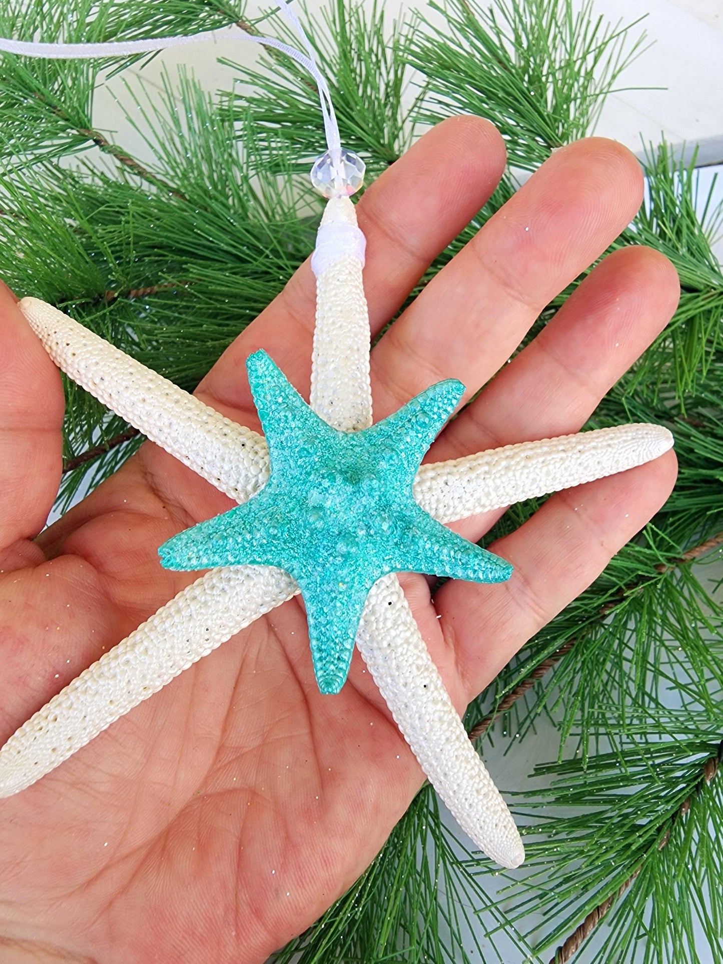 Starfish, sea glass and seashell holiday beach ornament. Aqua seaglass with natural pencil starfish and seashells. Approx 4-5 inch startish.