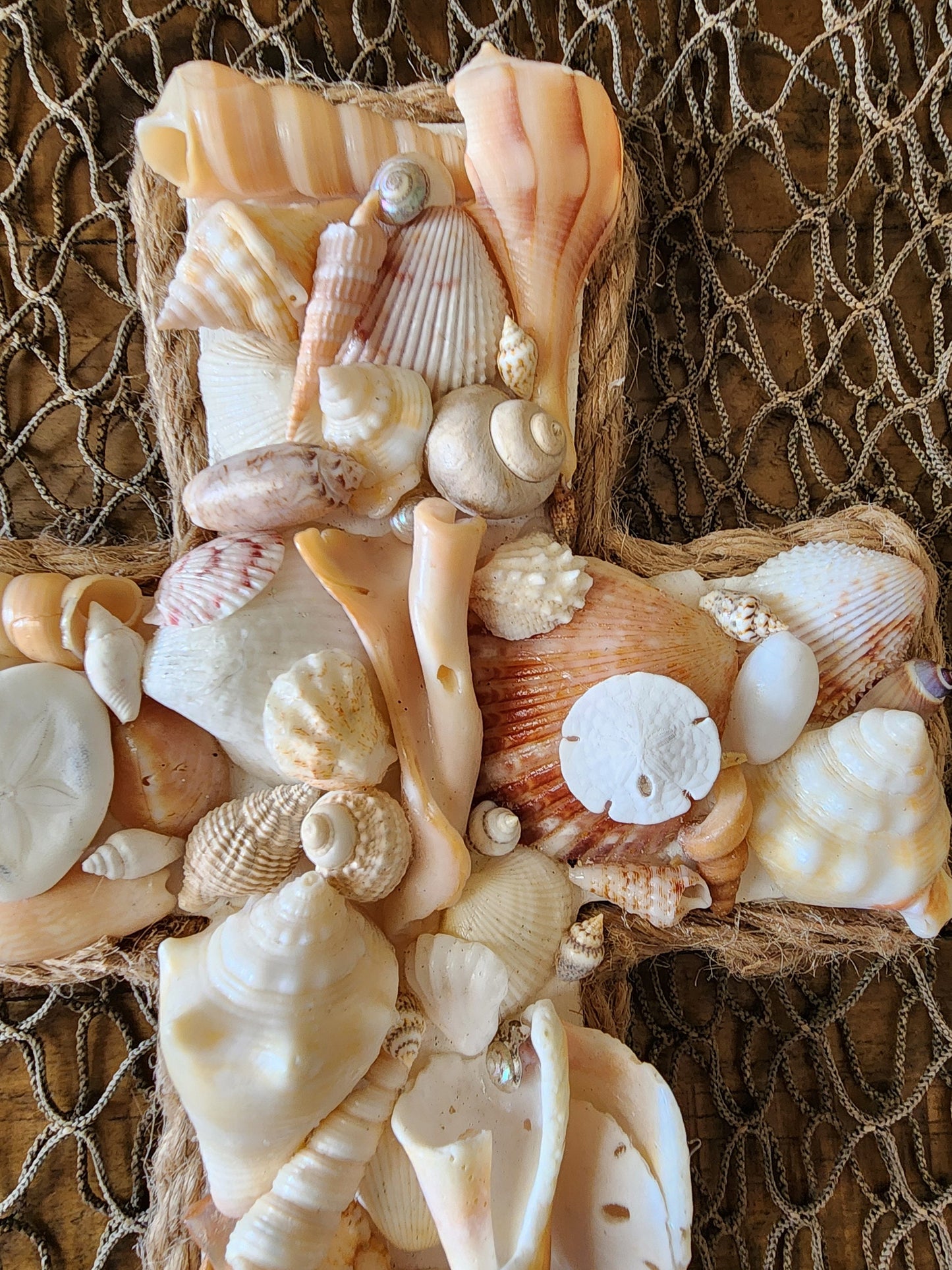 Coastal seashell cross 12x7 wall art. Perfect for a beach wedding, wedding gift, housewarming gift, or to add to your beach house decor