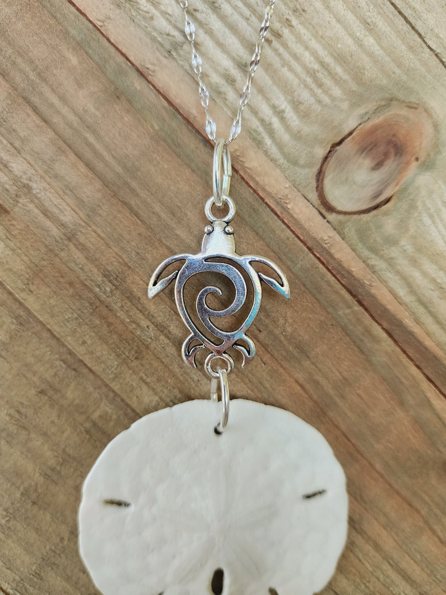 Genuine handmade sand dollar necklace, accented with a silver sea turtle charm. Sea turtle necklace. Sand dollar pendant. Beach necklace.