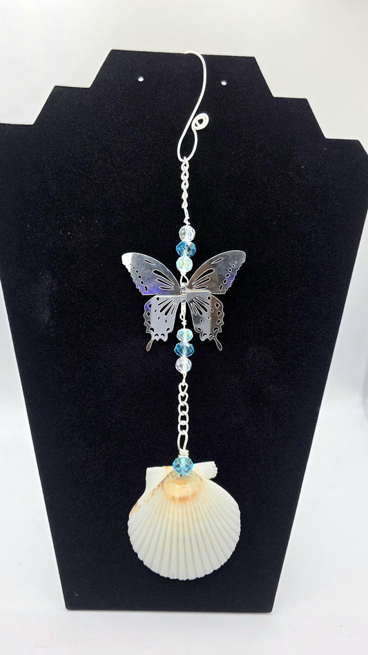Seashell suncatcher, car charm with butterfly,  blue and iridescent glass beads, and natural Florida scallop seashell. Approximate 10" long.