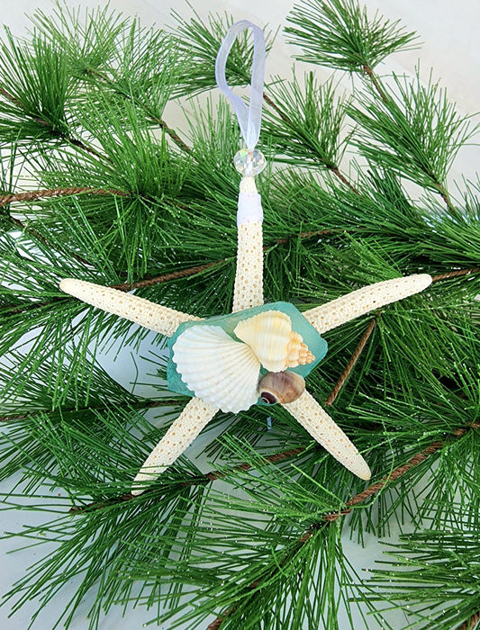 Starfish, sea glass and seashell holiday beach ornament. Aqua seaglass with natural pencil starfish and seashells. Approx 4-5 inch startish.