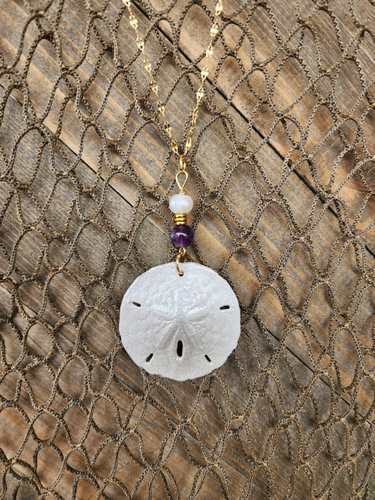Genuine handmade sand dollar necklace, accented with amethyst and fresh water pearl beads. Natural sand dollar pendant. Boho beach jewelry.