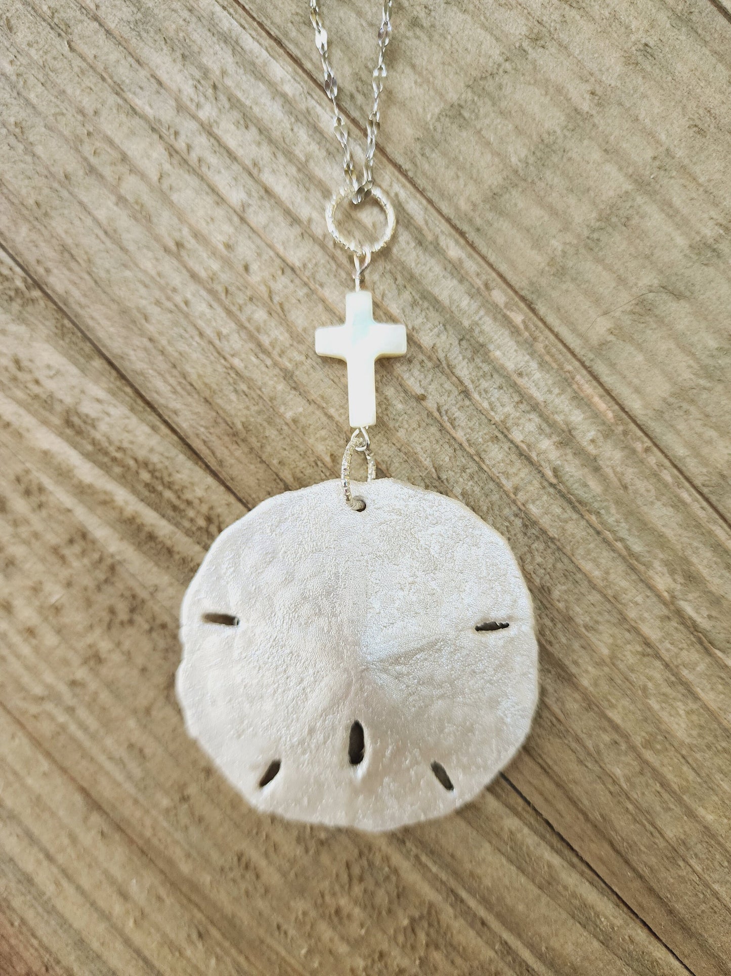 Real handmade sand dollar necklace, accented with an ivory genuine shell cross charm. Perfect for an Easter gift or Easter accessory.